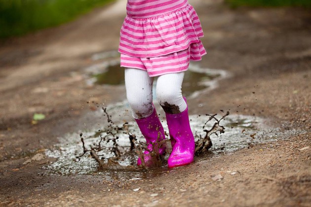 outdoor playgroup jump in puddles