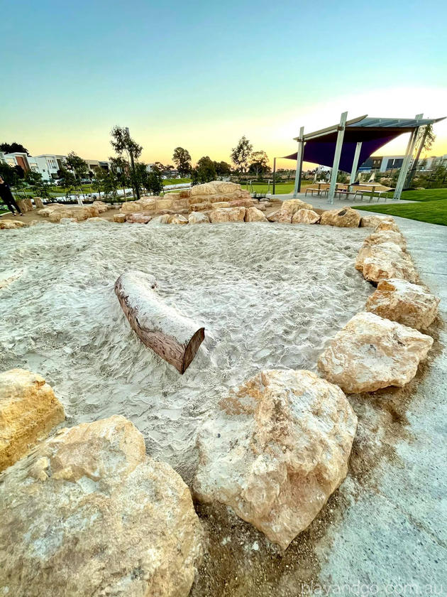 Lightsview playground dinosaur bones dig