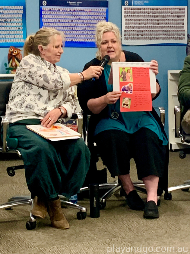 Tania Ingram holds a scrapbook she made with her daughter at a panel discussion at St Raphael's School in Parkside.